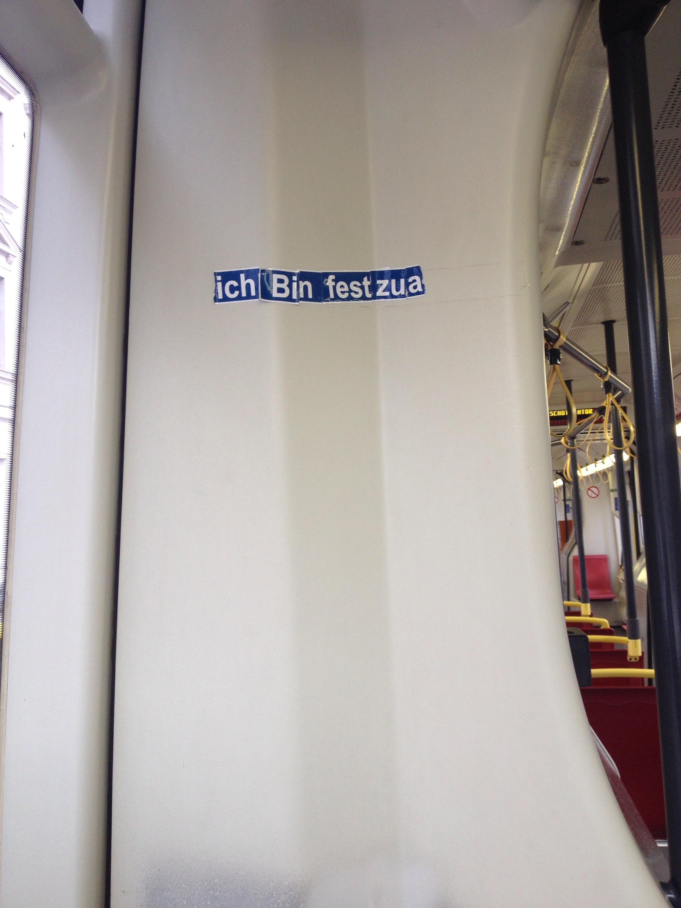 An image showing the sign "ich bin fest zua" aka I am totally drunk